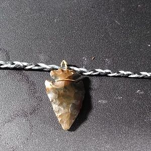 Arrowhead on tricolor braided hemp cord